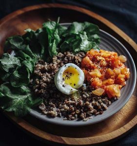 almost all plant-based breakfast with dark leafy greens and veggies plus egg