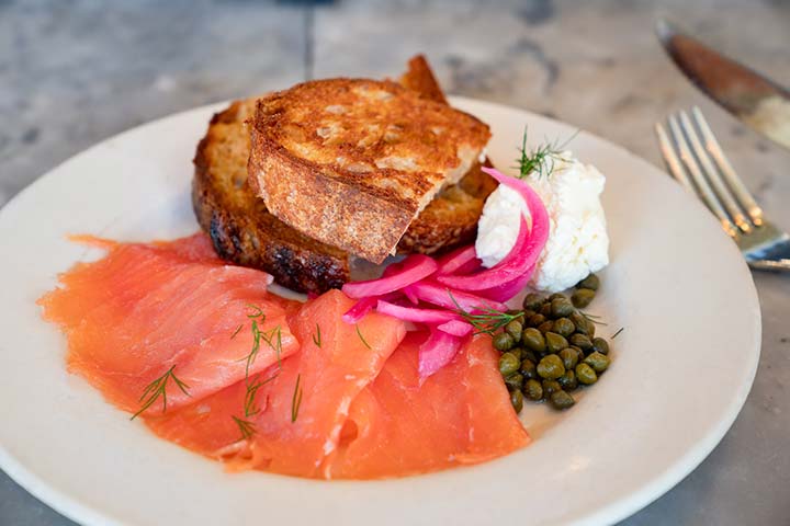 Wild smoked salmon toast with side salad (not shown) makes a delightful healthy breakfast at Plow in San Francisco, CA