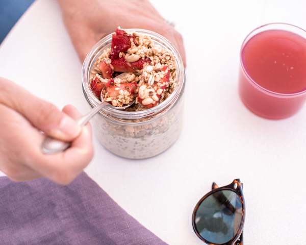 Organic overnight oats with seasonal berries, granola and more. Dairy-free and Vegan, at Raw & Juicy in Alys Beach, FL