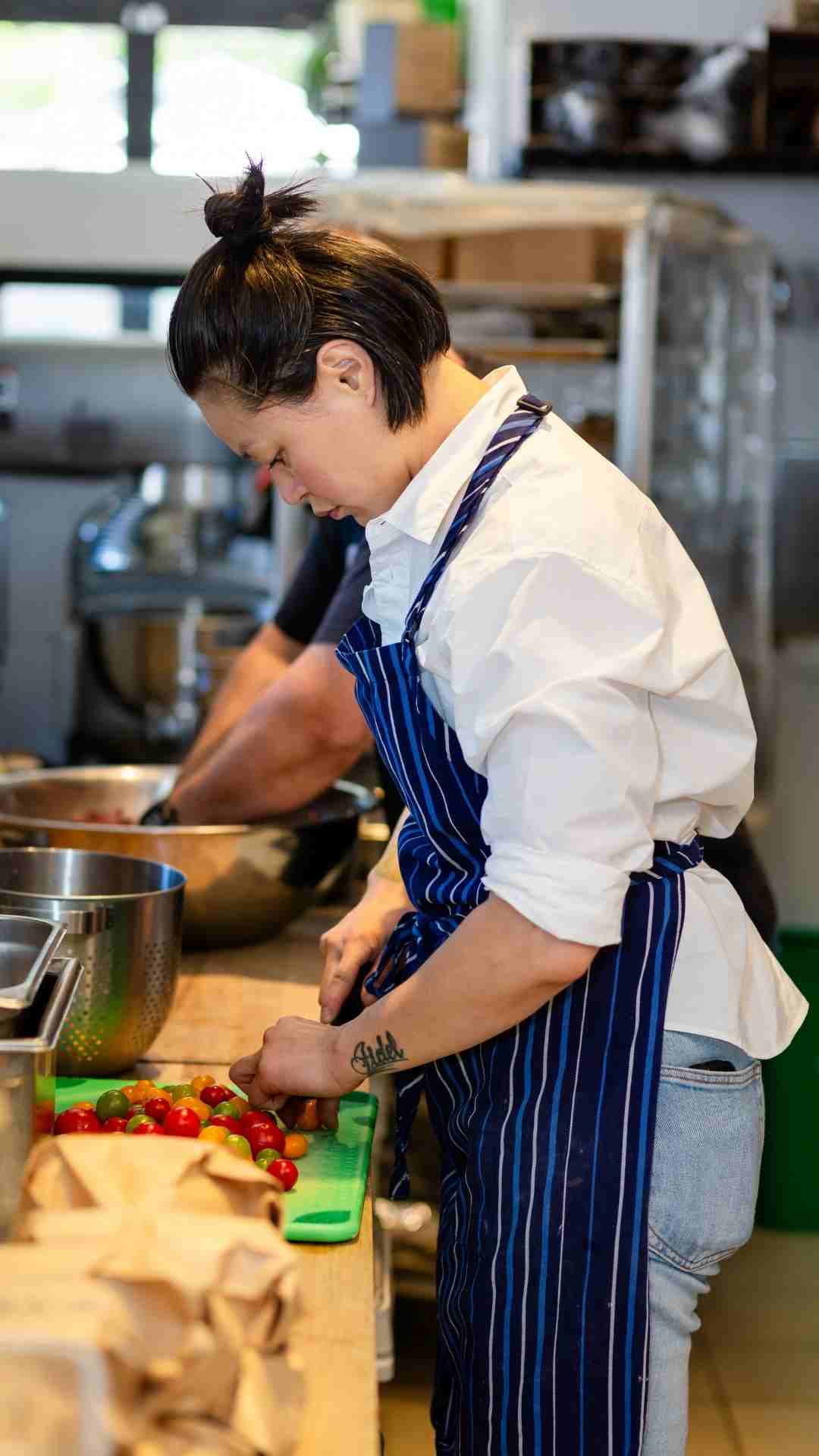 Sway Soturi preparing fresh vegetables at Forest and Flour in Fremont California